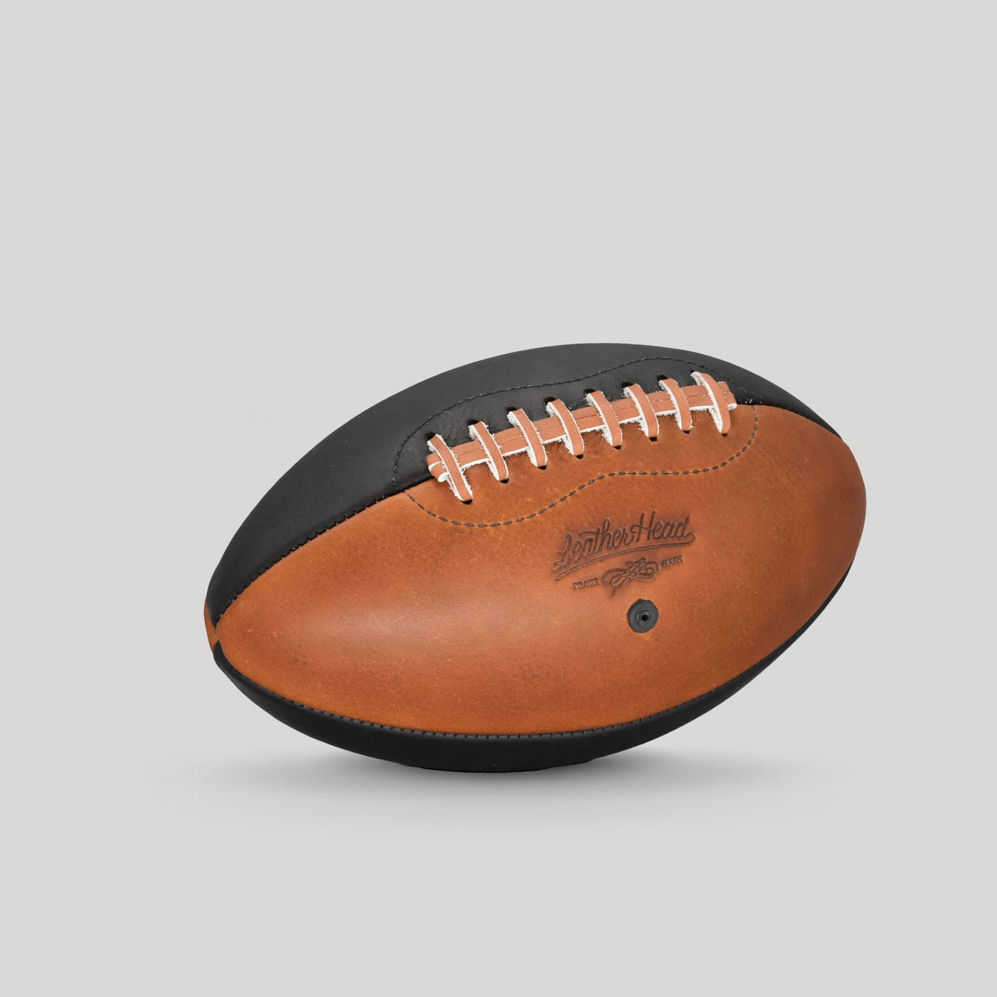 
                  
                    Pro Series Black and Tan Football
                  
                