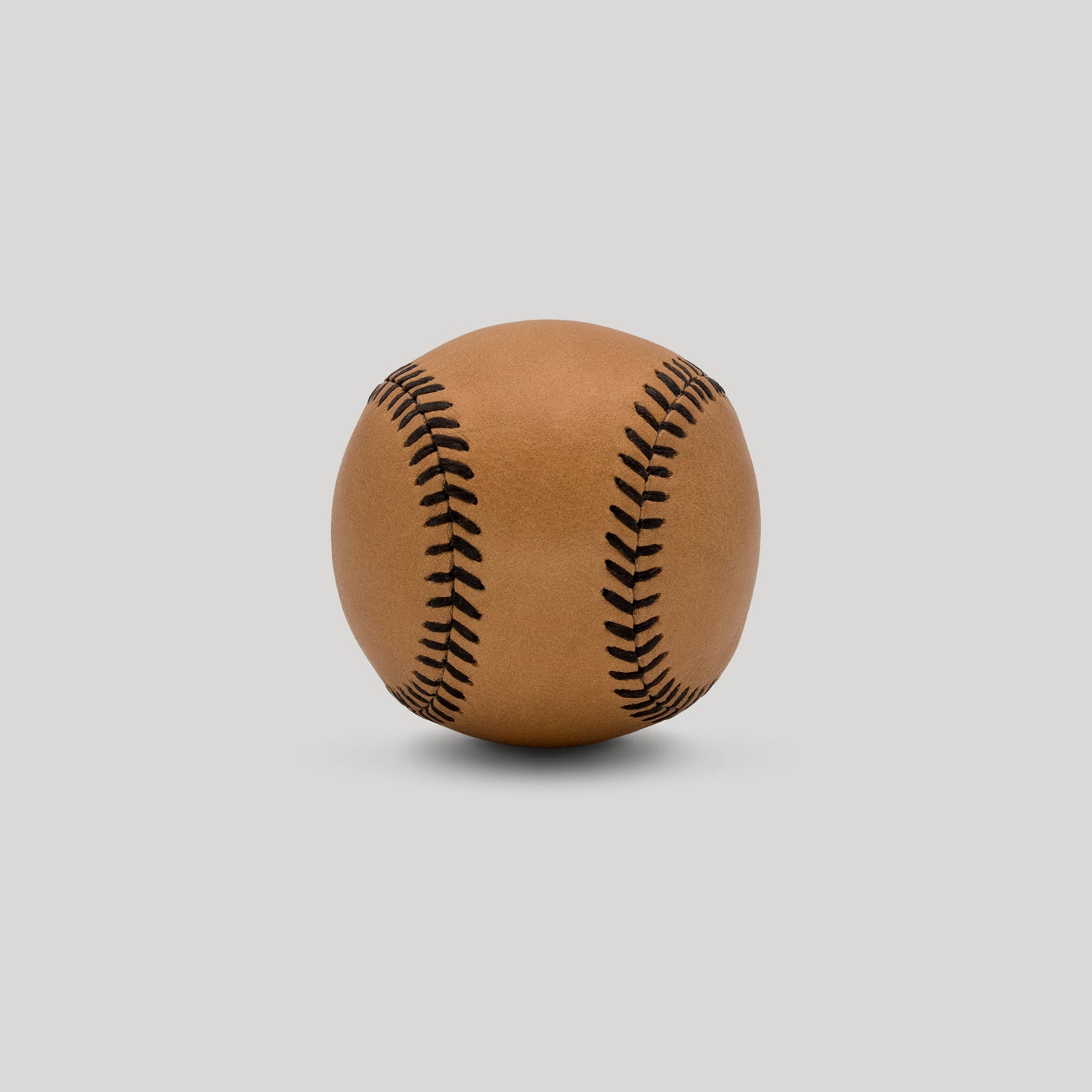
                  
                    Veg Tan Leather with Brown Stitch Figure 8 Ball
                  
                