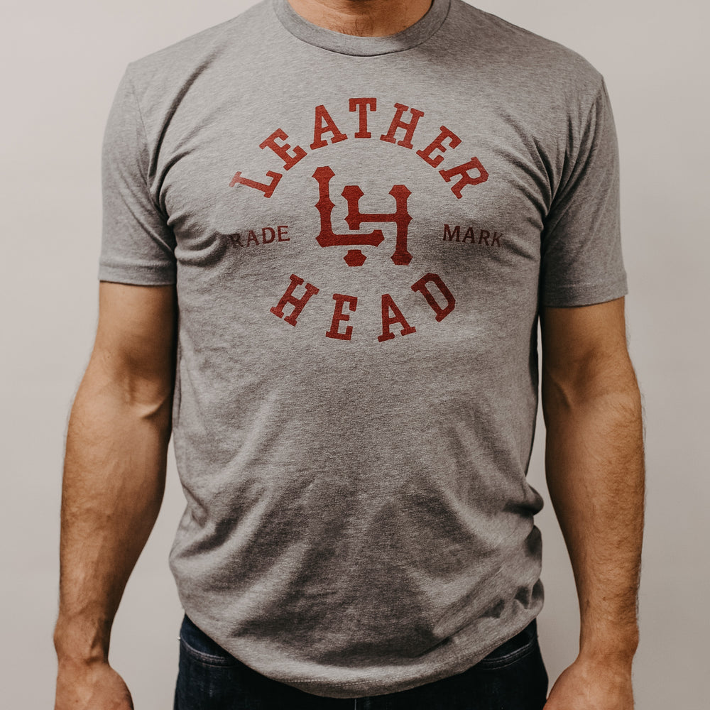 
                  
                    Leather Head Logo Tee Shirt - Light Grey
                  
                