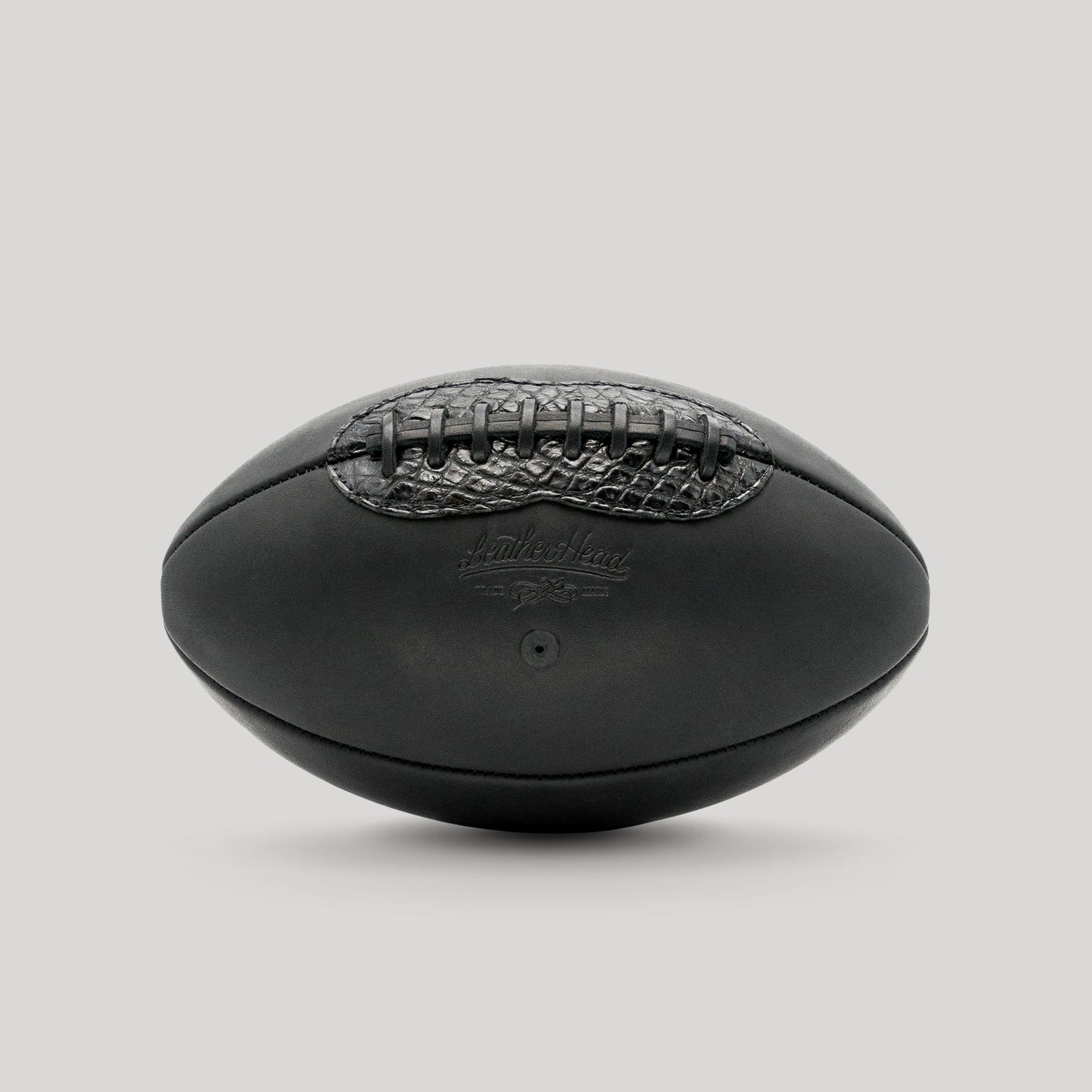 
                  
                    Black Onyx Football with Alligator Accent
                  
                